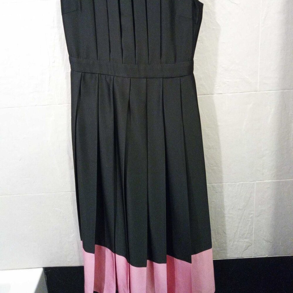 MSGM elegant pleated black dress with pink border.